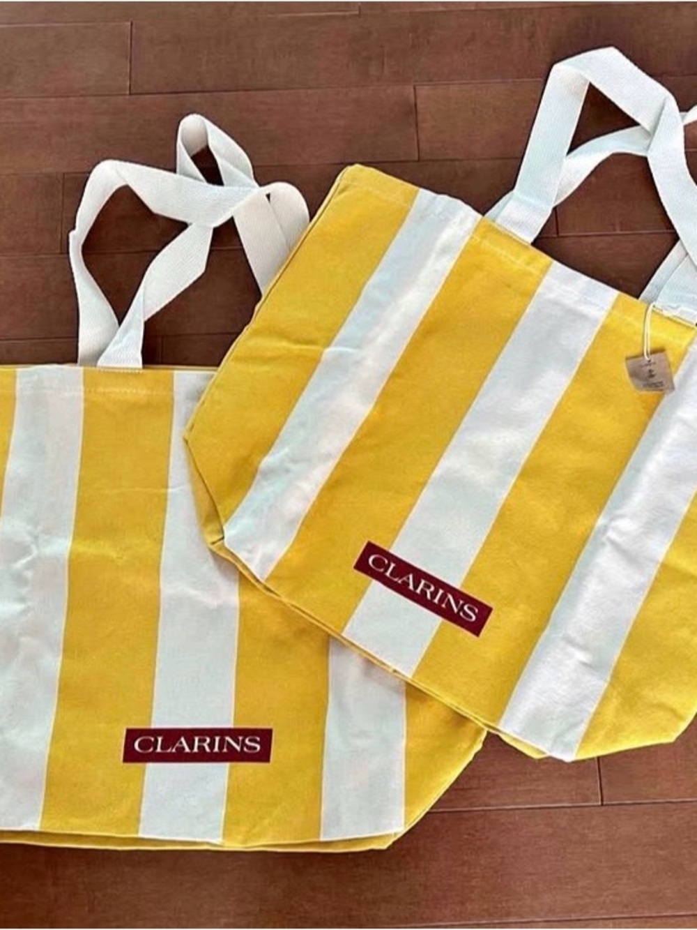 2/12$ Clarins Yellow & White Stripe Canvas Tote Bags - Picture 2 of 4